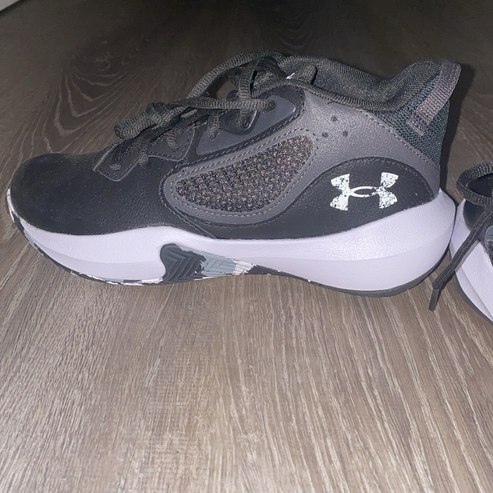 Brand new, size 5.5Y , Under Armour sneakers black and white
